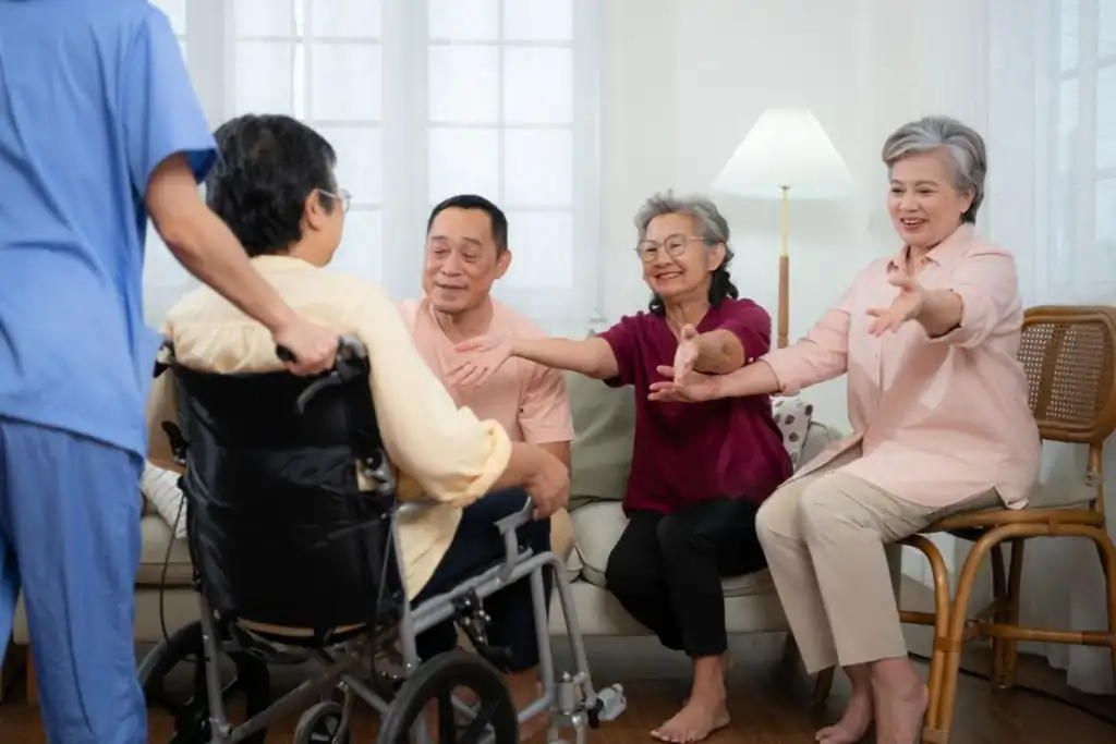 A group taking part in seated exercises together, illustrating support coordination in gympie.