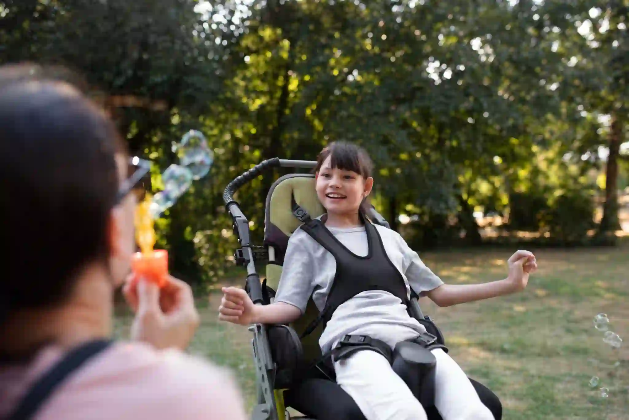Two people enjoying time together in a garden